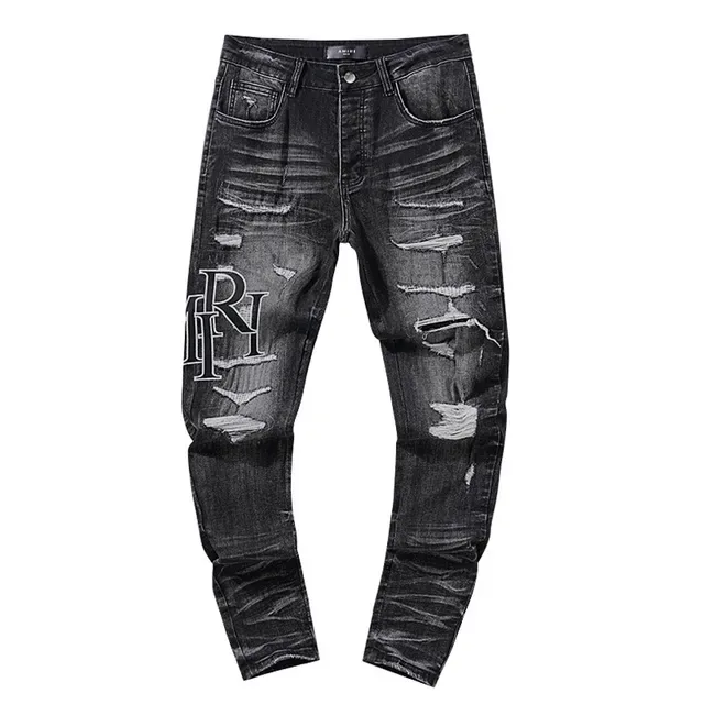 Jeans noirs déchirés brodés avec monogramme 2