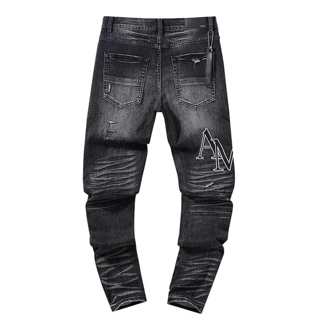 Jeans noirs déchirés brodés avec monogramme 3