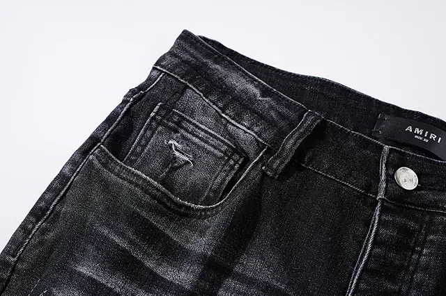 Jeans noirs déchirés brodés avec monogramme 7