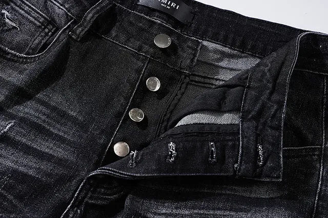 Jeans noirs déchirés brodés avec monogramme 13