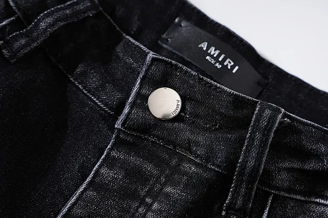 Jeans noirs déchirés brodés avec monogramme 14