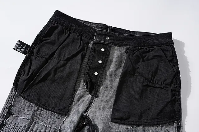 Jeans noirs déchirés brodés avec monogramme 15