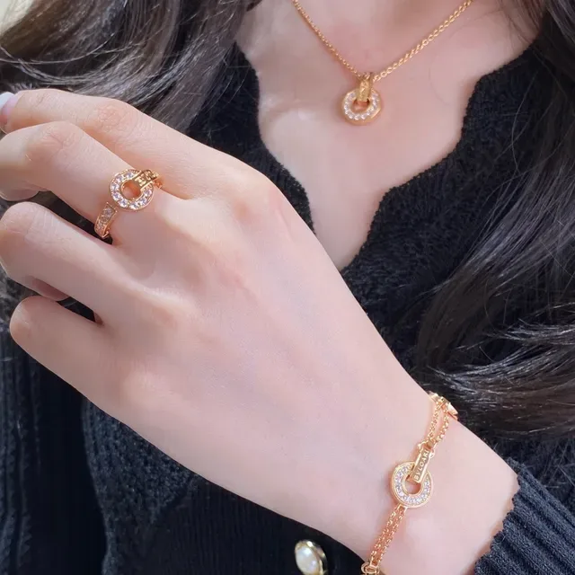 Gold and Silver Tone Pavé Diamond Circle Pendant Necklaces 8