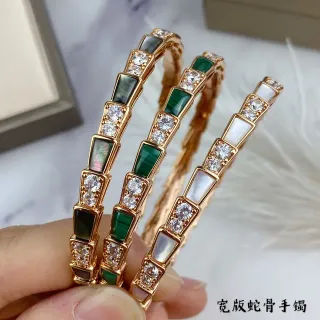 سوارة ذهبية خضراء مقسمة بنجيل مع اكسنتات كريستال بفيه