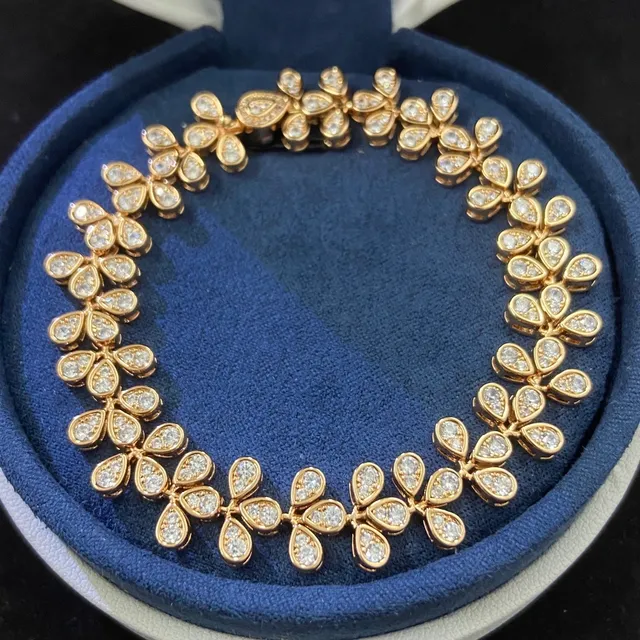 Pulseira de maillons em forma de lágrima com motivo floral pavé em ouro e prata 6
