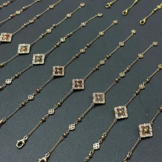 سوارات السلاسل ذهبية اللون بمينا نمط أربعة أوراق