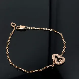Pulsera con Cadena Retorcida de Tono Dorado y Colgante de Corazón