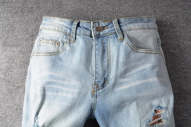Pantalones vaqueros lavado claro distressed slim fit ripped 7