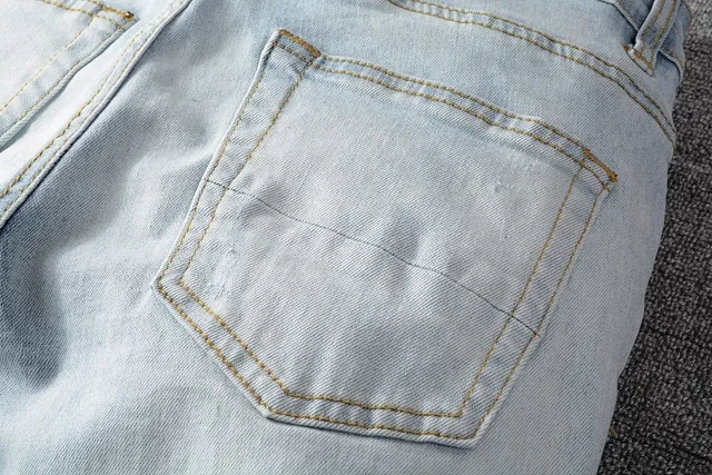 Pantalones vaqueros lavado claro distressed slim fit ripped 13
