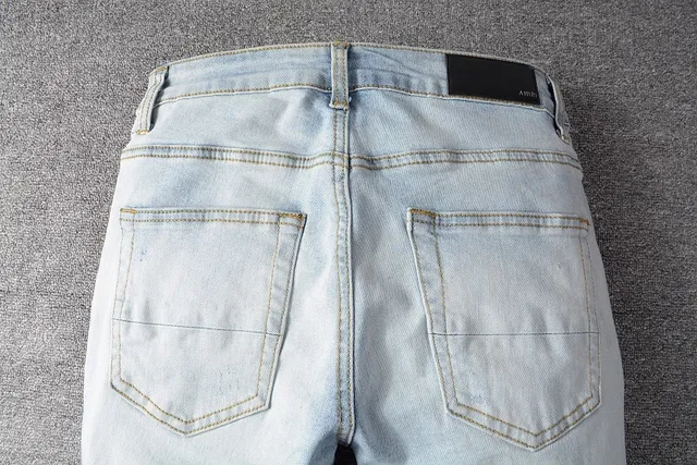 Pantalones vaqueros lavado claro distressed slim fit ripped 14