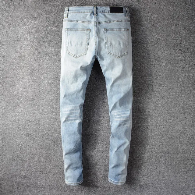 Pantalones vaqueros lavado claro distressed slim fit ripped 16