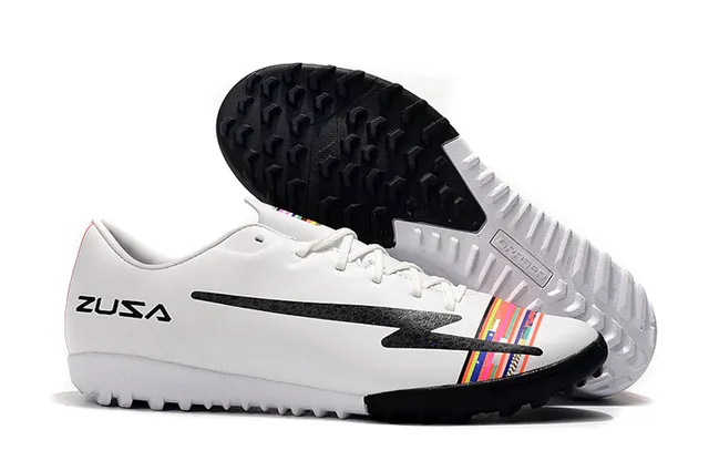Orange et blanc tacheté Low-Cut Firm-Ground chaussures de football 4