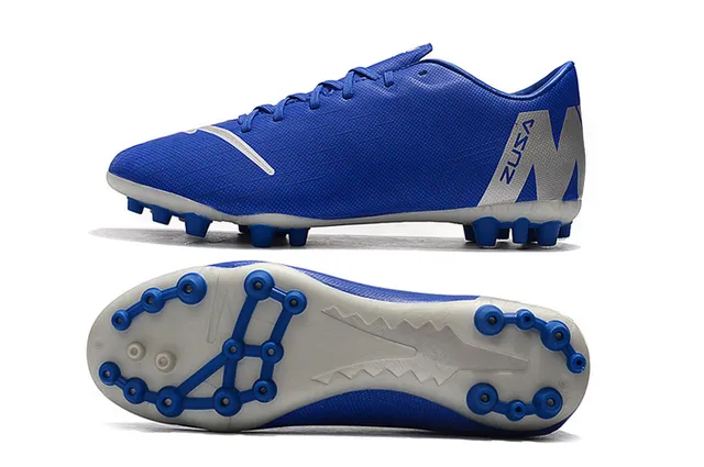 Orange et blanc tacheté Low-Cut Firm-Ground chaussures de football 11