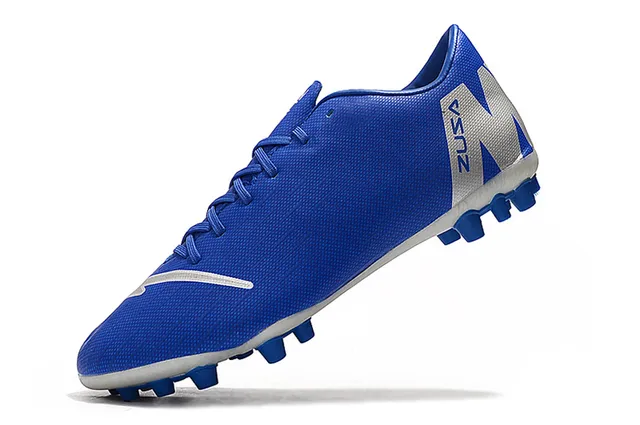 Orange et blanc tacheté Low-Cut Firm-Ground chaussures de football 12