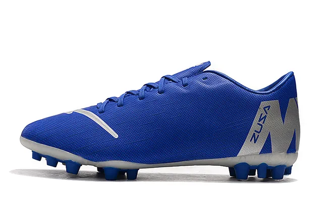 Orange et blanc tacheté Low-Cut Firm-Ground chaussures de football 13