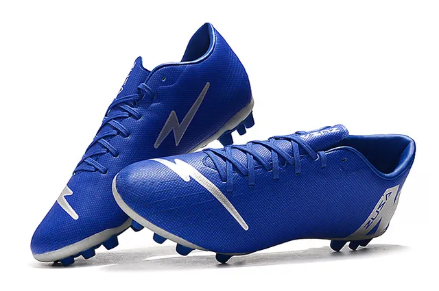 Orange et blanc tacheté Low-Cut Firm-Ground chaussures de football 14