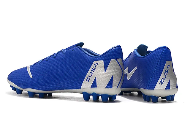 Orange et blanc tacheté Low-Cut Firm-Ground chaussures de football 16