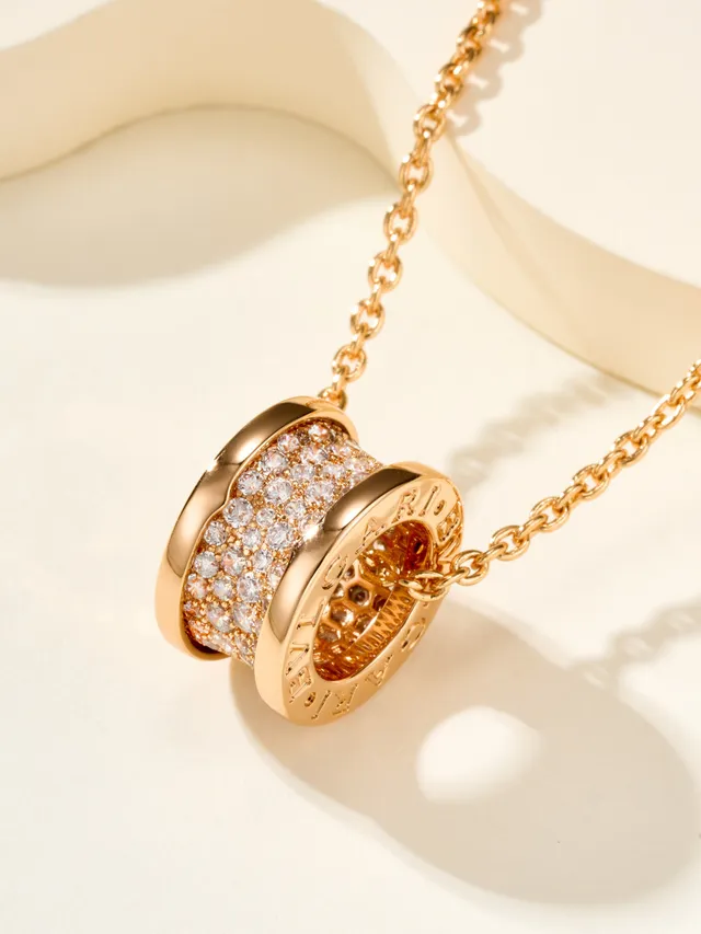 Collares con colgantes de barril Pavé en tono plata y oro 14