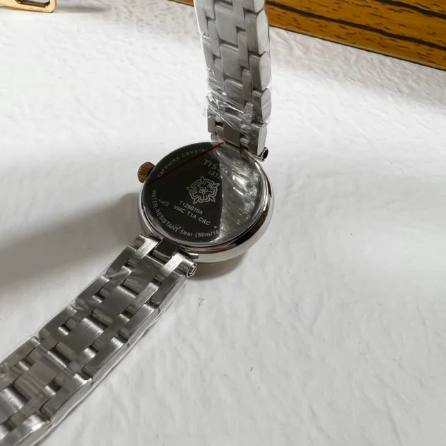 Tissot Silver White Round Case Sunburst Dial Quartz Watch 2