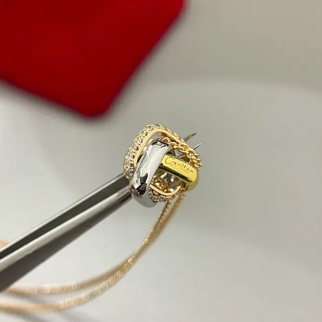 Two-Tone Gold and Silver Interlocking Heart Crystal Pendant Necklaces 3