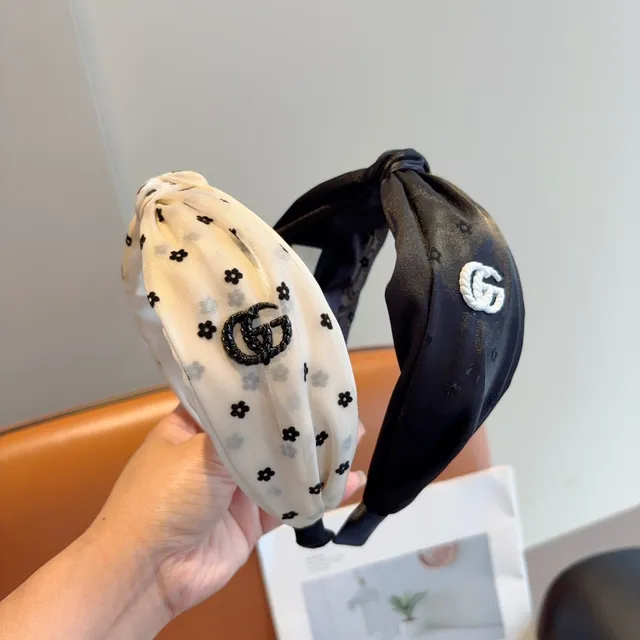 Gucci काला सफेद मुड़ी हुई गाँठ सिलाई लोगो टोपी 2