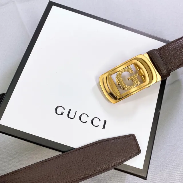 حزام Gucci Double G جلد بني ملمس مشبك ذهبي اللون 4