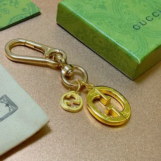 Gucci Double G سوار ذهبي اللون مع سلسلة المفاتيح
