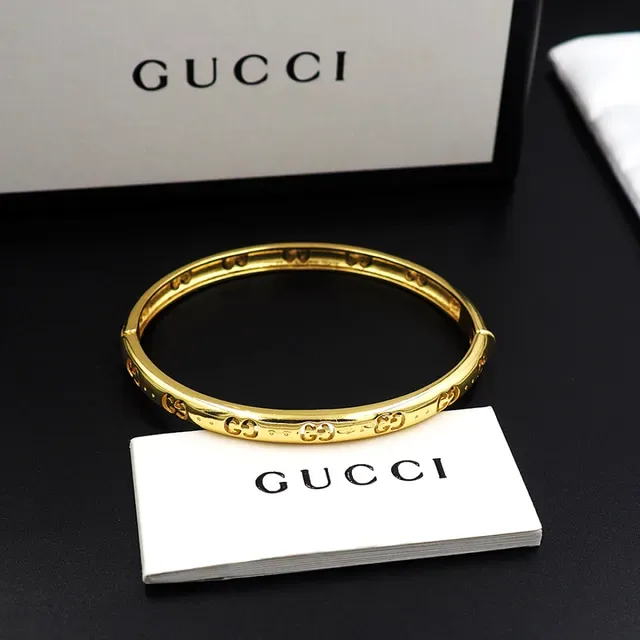 Gucci गोल्ड पॉलिश्ड इंटरलॉकिंग GG मोटिफ ब्रेसलेट 6