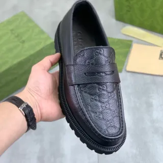 Gucci Rhyton কালো এমবসড GG Loafer