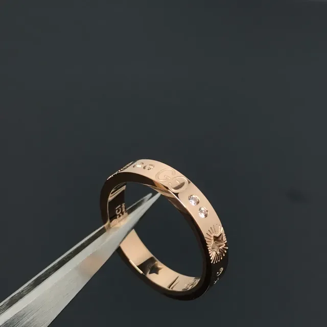 Gucci Bague Argent Or Gravée Motif Étoile-Sunburst Détail Logo G Interlocking 3