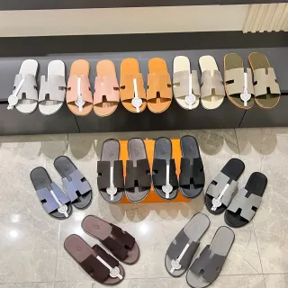 صنادل مسطحة Hermès Oran رمادي أبيض حزام شكل H