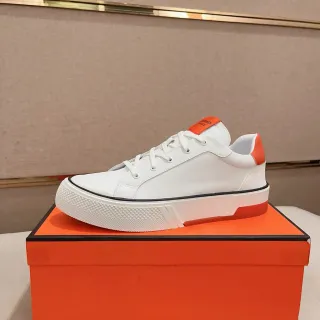Hermès تينيس أبيض وبرتقالي منصة