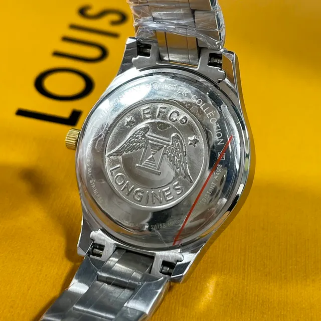 Longines चांदी और सोने का दो टोन स्टेनलेस स्टील सफेद गिलोशे डायल क्वार्ट्ज घड़ी 2