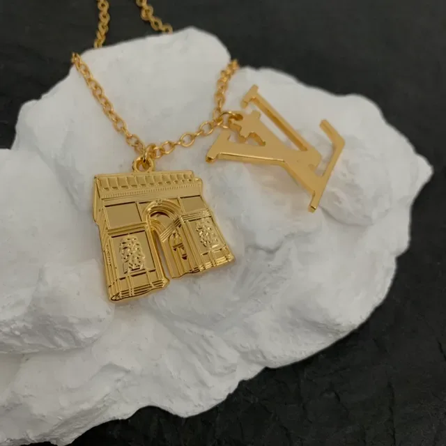 Louis Vuitton Arc de Triomphe and LV Monogram Gold-Tone Necklace 5
