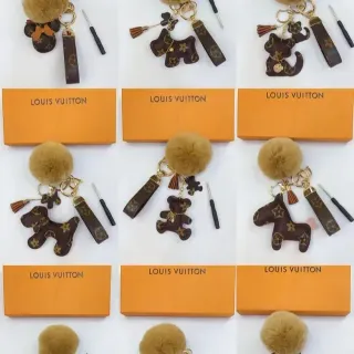 Louis Vuitton Brown Beige Monogram Canvas Fur Pom-Pom Phone Accessory