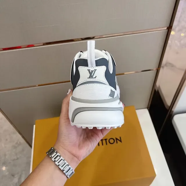 Louis Vuitton LV Trainer White Black Sole Flame-Inspired Graphic Overlays Chunky Sneakers 4