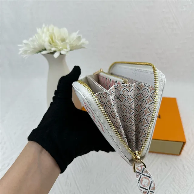 Louis Vuitton monograma flor carteira longa branca azul roxa 15
