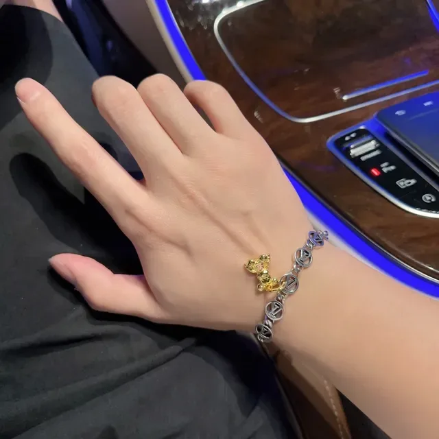 Bracelet Louis Vuitton Chaîne Curb Argent et Or Monogram Disc Charms 2