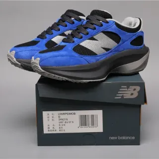 New Balance Sneakers chunky bleu noir bold en suede et mesh oversized gris 'N' logo