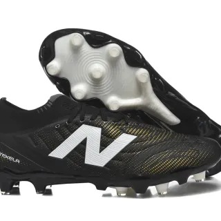 New Balance Tekela কালো সোনালি নিম্ন-কাট সক-ফিট কলার ফার্ম-গ্রাউন্ড ফুটবল জুতো