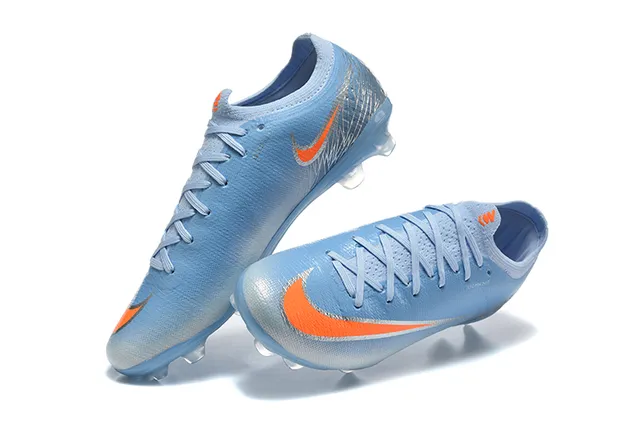 Nike أزرق برتقالي منخفض القطع أعلى ملائم للجوارب نسيج صناعي محكم الملمس أرض صلبة أحذية كرة القدم 2