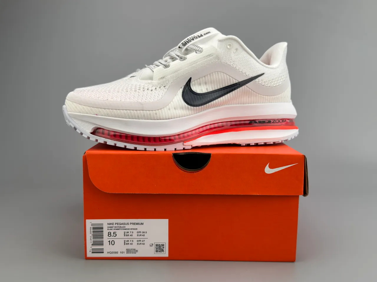 Chaussures de course Nike blanches et rouges Visible Air 2