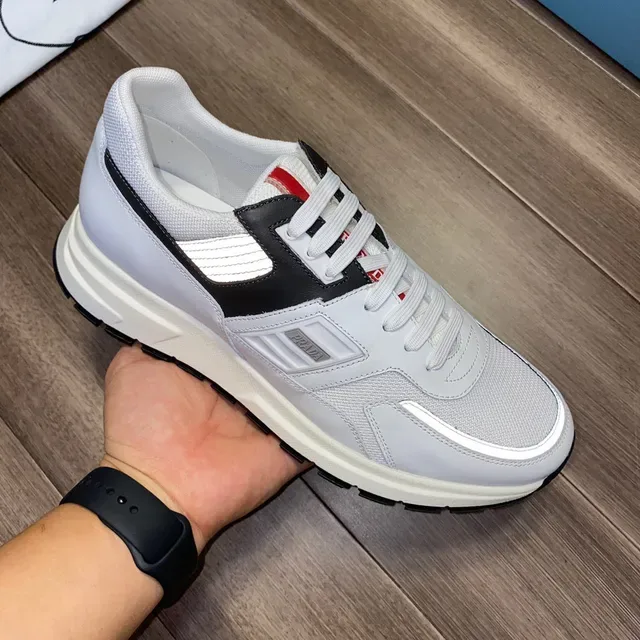 Prada Cloudbust blancas negras reflectantes zapatillas lifestyle 4