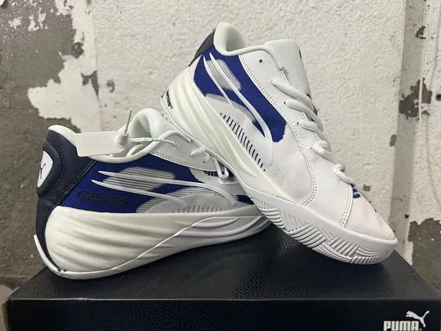 Puma All-Pro Nitro أبيض أزرق طبقة شبكية وصناعية علوية وسطية منحوتة أحذية كرة السلة 2