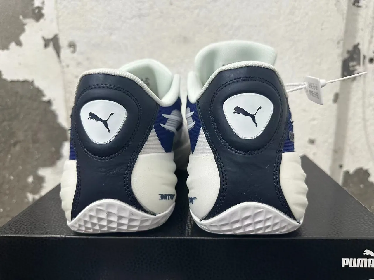 Puma All-Pro Nitro أبيض أزرق طبقة شبكية وصناعية علوية وسطية منحوتة أحذية كرة السلة 3