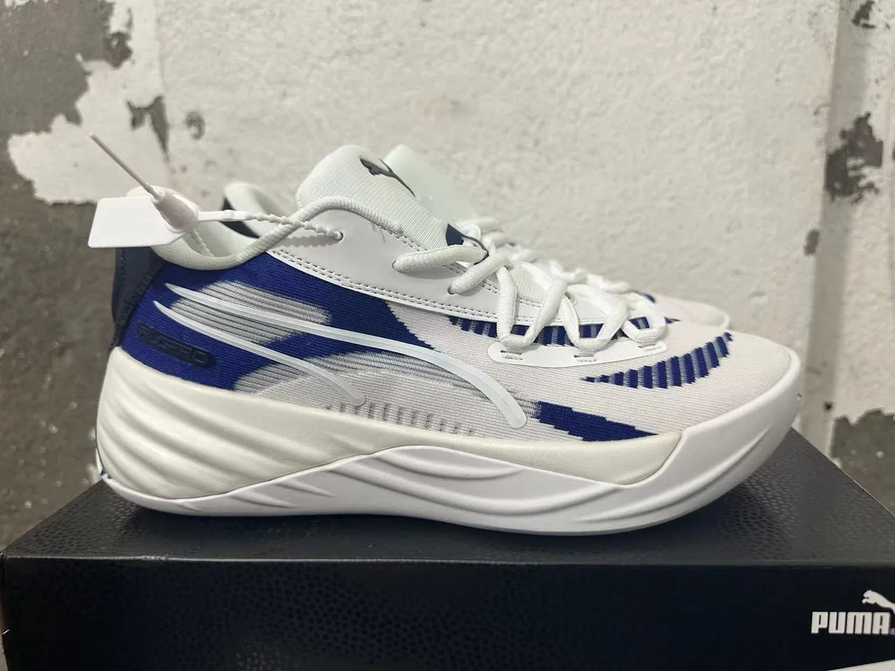 Puma All-Pro Nitro أبيض أزرق طبقة شبكية وصناعية علوية وسطية منحوتة أحذية كرة السلة 5