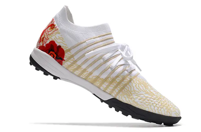 Puma Future Z কমলা সবুজ নিট উপর ছিদ্রযুক্ত বায়োচ্ছায়া টার্ফ ফুটবল জুতা 23