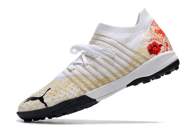Puma Future Z কমলা সবুজ নিট উপর ছিদ্রযুক্ত বায়োচ্ছায়া টার্ফ ফুটবল জুতা 24