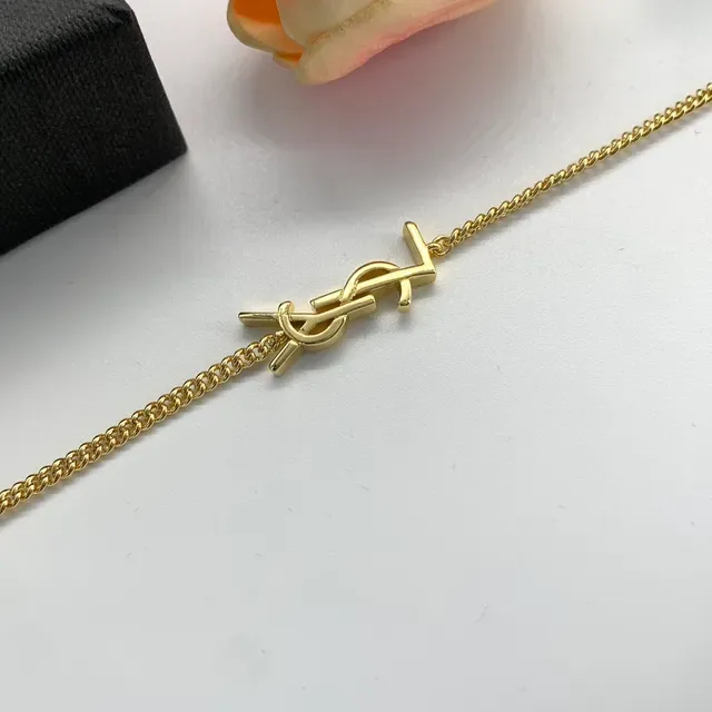 سوارات Saint Laurent Monogram ذهبي وفضي سلسلة 5