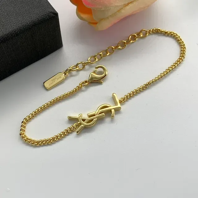 سوارات Saint Laurent Monogram ذهبي وفضي سلسلة 6